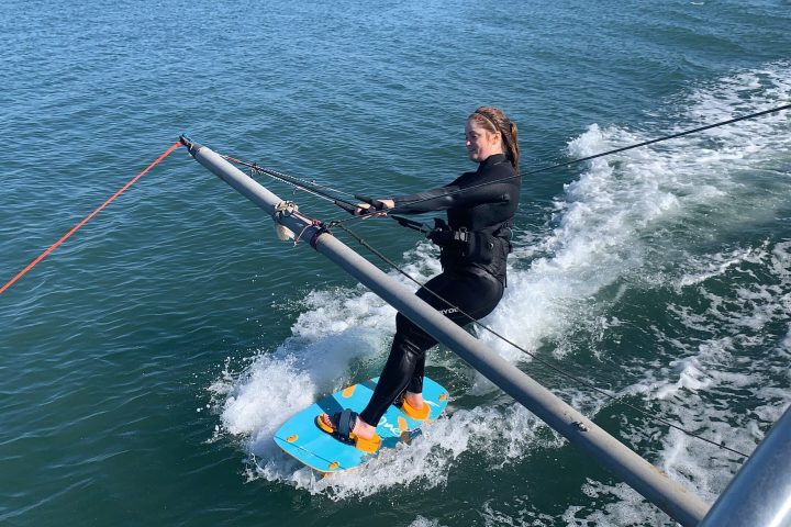 a person riding skis on a body of water