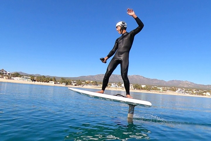 a person riding a surfboard in the water